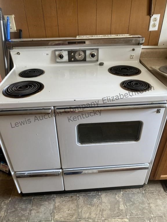 General Electric stove four burners. 40x26x44”