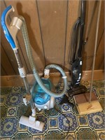 Kenmore vacuum , zoom broom, and dirt devil.