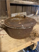 Vintage cast-iron Dutch oven pot with lid