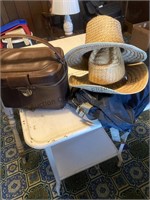 Straw hats and two carrying cases