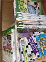 Box of crossword puzzles and more