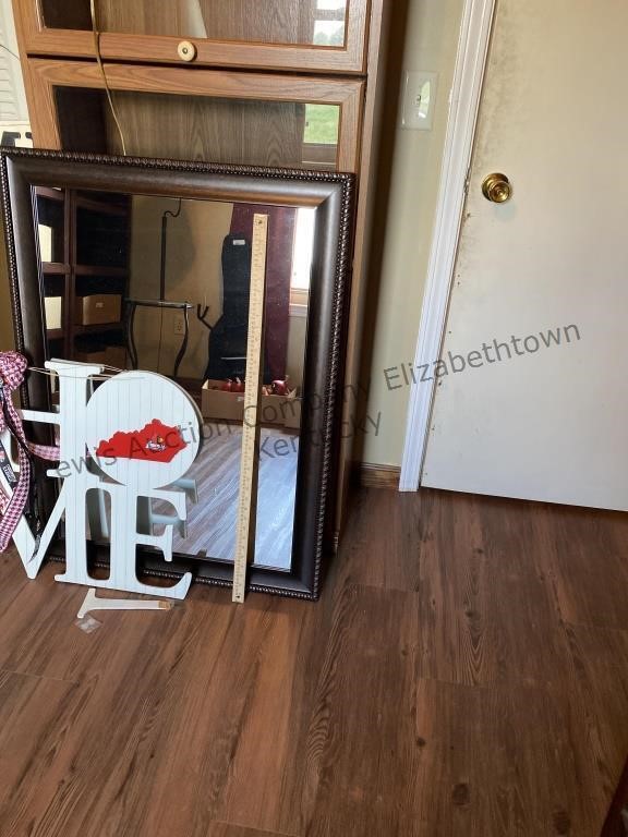 Large mirror and university of Louisville home