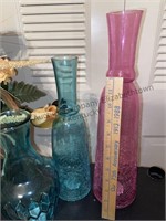 Floral arrangement and decorative vases
