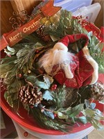 Two Christmas wreath in a storage case