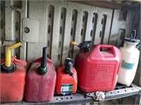 4 gas cans and round up sprayer