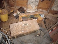 Empty metal tool box and a wooden box with a
