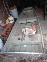 Aluminum boat and more. Boat has 2 cracks along