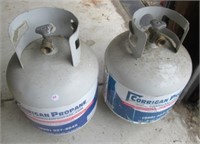 (2) Propane tanks.