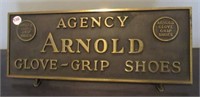 Bronze Arnold Glove-Grip shoes agency plaque.