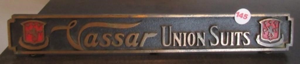 Vassar Union Suits brass plaque. Measures: 2" H x