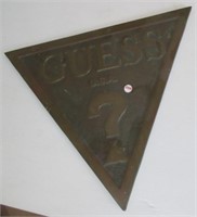 Bronze/brass Guess USA plaque. Measures: 17.5" H