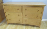 6-Drawer dresser. Measures 32" H x 50" W x 18" D.