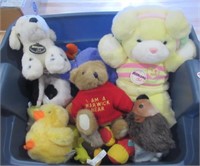 Tote with lid of clean stuffed animals, includes