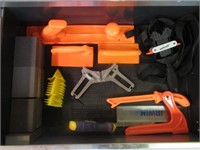 Contents of drawer that includes table saw push