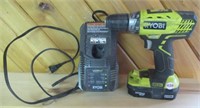 Ryobi 18 volt drill with battery and charger.