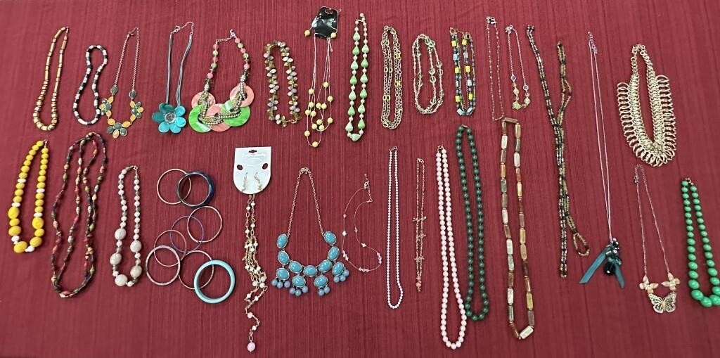 29 Necklaces-2 have matching earrings and 9