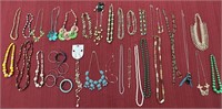 29 Necklaces-2 have matching earrings and 9