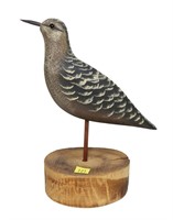 Carved wooden shorebird on wood base, bird signed