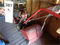 Troy Bilt rear tine rototiller (two pictures)