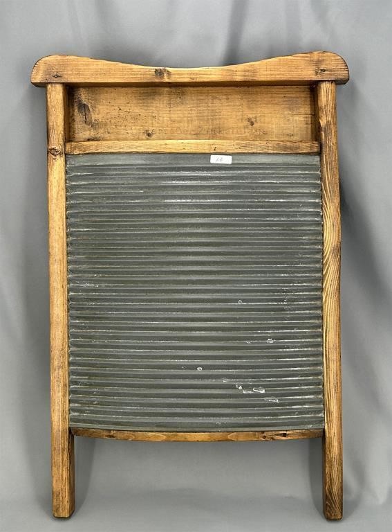 Unusual wash board with curved tin
