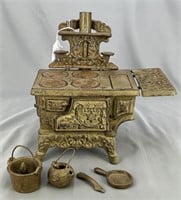 Crescent cast iron toy stove