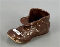 Albany slip baby shoe marked Dickey Pottery