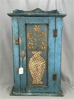 Early hanging cupboard with punched tin door