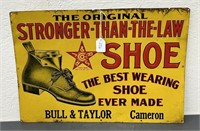 Stronger than the Law Shoes advertising tin sign