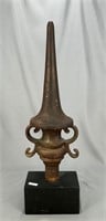 Cast iron decorative finial on stand