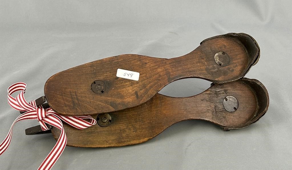Pair of wooden ice skates