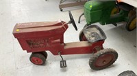 Red peddle tractor metal