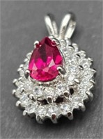 Created Ruby, cubic zirconia pendant set in SS