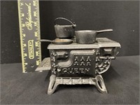 Vintage Queen Cast Iron Miniature Toy Cookstove