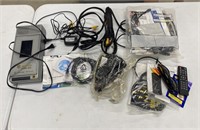 Group of Cords, Remotes, and More