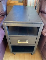 side table with electrical outlet on