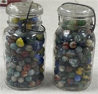 2 quart jars of marbles