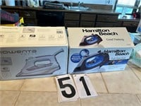 2 Steam irons in boxes