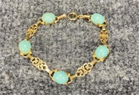 14KT Gold Bracelet with Green Stones 14.5 grams