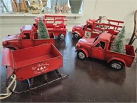 Red Christmas metal trucks