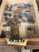 Box of dog tags and others