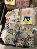 Tray of canceled stamps, and others