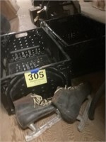 Two crates and a pair of men’s ice skates