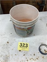Partial bucket of lucky buck minerals