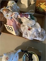 Box of porcelain dolls