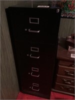 Four drawer locking metal file cabinet
With key