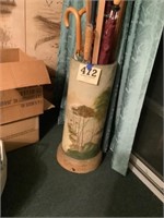 Painted umbrella holder with umbrellas