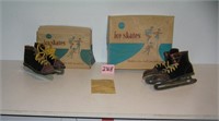 2 pairs of early leather and metal ice skates