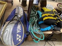 Tennis racket ,ski vests and rope