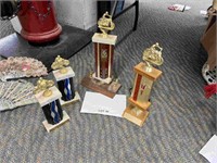 5-motorcycle racing trophies
