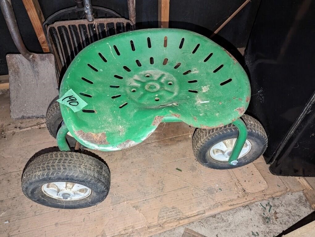 Antique seat on 3 wheel running gear